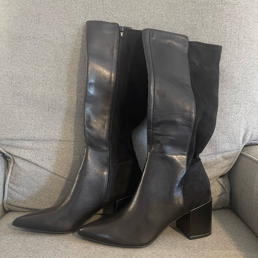 Great, comfortable heeled boot. Hits right below the knee